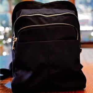Black Backpack with Gold Accents